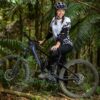 Woman on a Mountain Bike in Forest